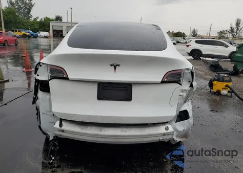 2023 Tesla Model Y from USA, damaged, VIN 7SAYGDED1PF962095
